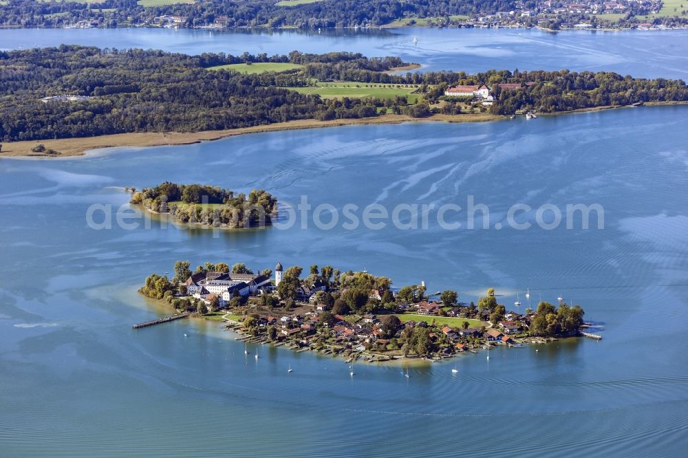Aerial image Gstadt am Chiemsee - Insel Frauenchiemsee aka Fraueninsel with building complex of the Benedictine Abbey Frauenwoerth in the Chiemsee in the district of Rosenheim in the state of Bavaria
