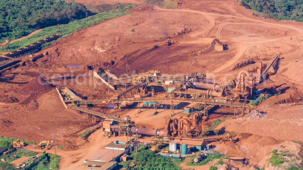 Discovery Bay from above - Conveyors and mining pits at the headframe Noranda Bauxite Limited on street A1 in Discovery Bay in St. Ann Parish, Jamaica