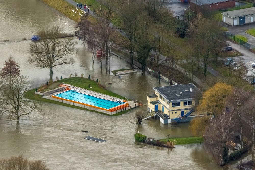 Essen from the bird's eye view: Flooding of the Ruhr at the swimming pool of the outdoor swimming pool Freibad Essen Steele an der Ruhr on Westfalenstrasse in the district Steele in Essen in the Ruhr area in the state North Rhine-Westphalia, Germany