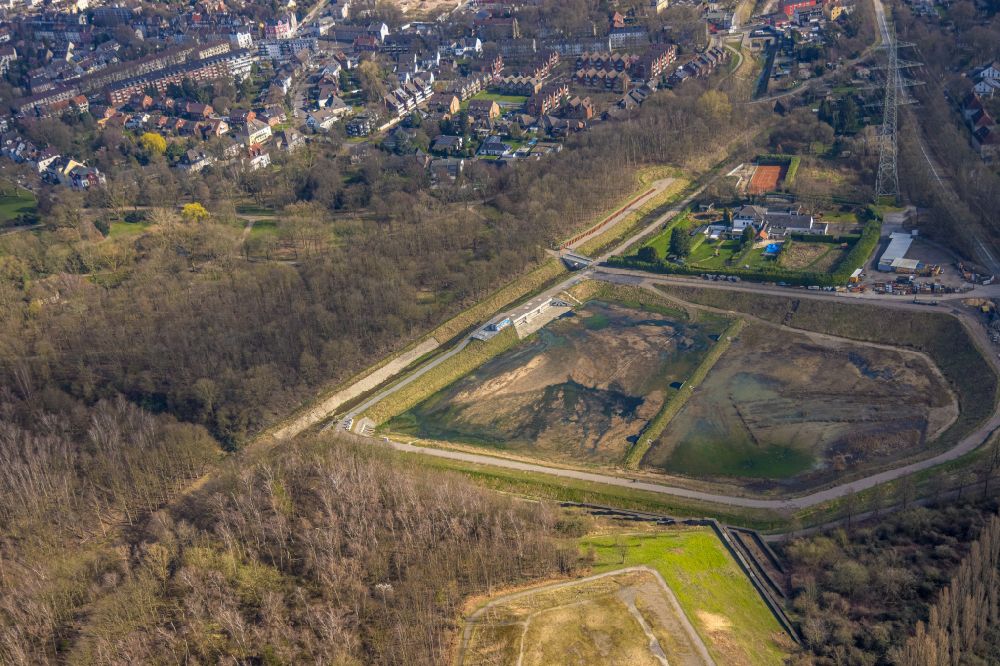 Gelsenkirchen from the bird's eye view: As part of the rehabilitation and repair exposed ground of the water reservoir and retention basin on Hollandstrasse in Gelsenkirchen in the state North Rhine-Westphalia, Germany