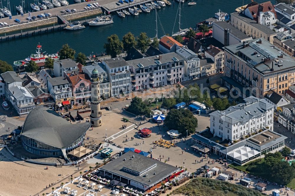 Rostock from above - Tables and benches of open-air restaurants building - Ensemble Leuchtturm - Teepott in the district Warnemuende in Rostock in the state Mecklenburg - Western Pomerania, Germany