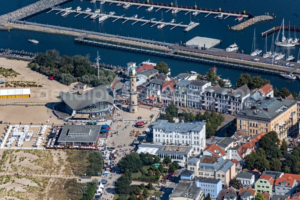 Aerial image Rostock - Tables and benches of open-air restaurants building - Ensemble Leuchtturm - Teepott in the district Warnemuende in Rostock in the state Mecklenburg - Western Pomerania, Germany
