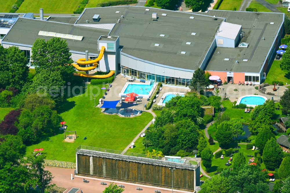 Arnsberg from the bird's eye view: Thermal bath and swimming pool at the outdoor pool of the leisure facility NASS - Freizeitbad Arnsberg with the sports center Grosse Wiese in Arnsberg in the Sauerland in the state North Rhine-Westphalia, Germany