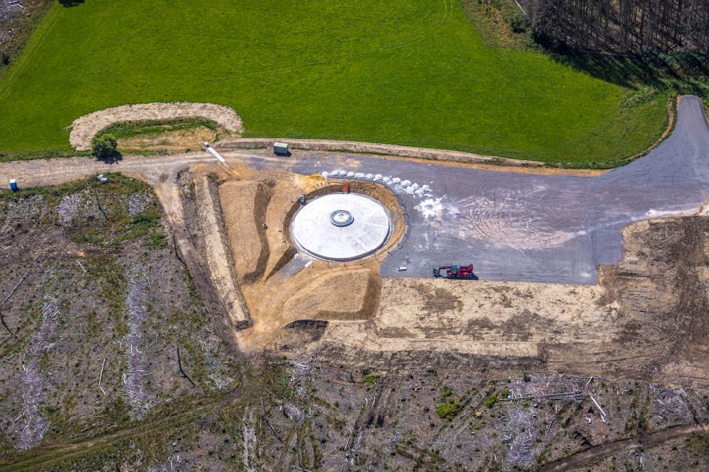Aerial photograph Breckerfeld - Construction site for the construction of a steel and concrete foundation in a circular shape as a base for the installation of a WEA wind turbine - wind turbine on street Landwehr in Breckerfeld in the state North Rhine-Westphalia, Germany