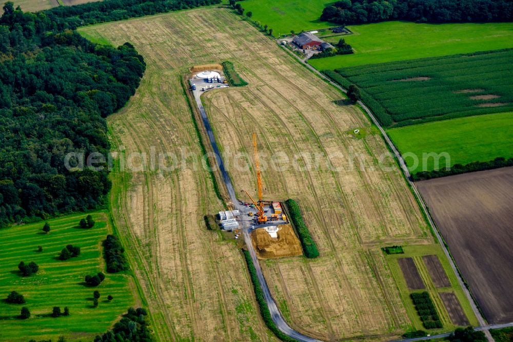 Aerial photograph Datteln - Construction site for the construction of a steel and concrete foundation in a circular shape as a base for the installation of a WEA wind turbine - wind turbine in Datteln at Ruhrgebiet in the state North Rhine-Westphalia, Germany
