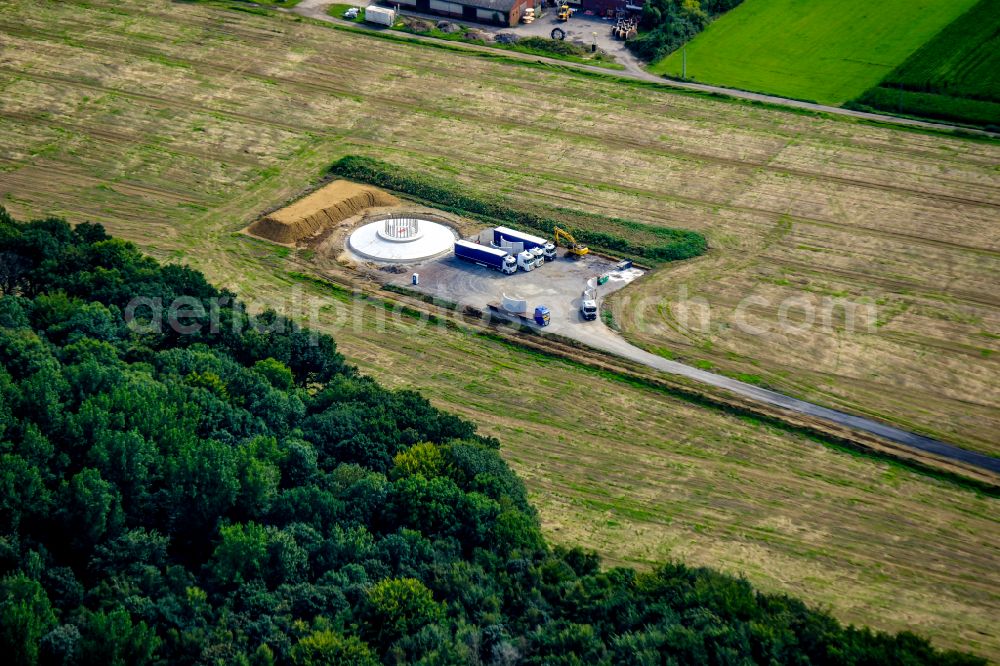 Datteln from the bird's eye view: Construction site for the construction of a steel and concrete foundation in a circular shape as a base for the installation of a WEA wind turbine - wind turbine in Datteln at Ruhrgebiet in the state North Rhine-Westphalia, Germany