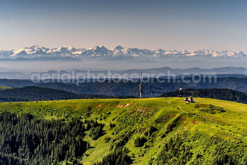 Feldberg (Schwarzwald) from the bird's eye view: Funkturm and transmission system as basic network transmitter with mountain ranges of the Alps in the background in Feldberg (Schwarzwald) in the state Baden-Wurttemberg, Germany