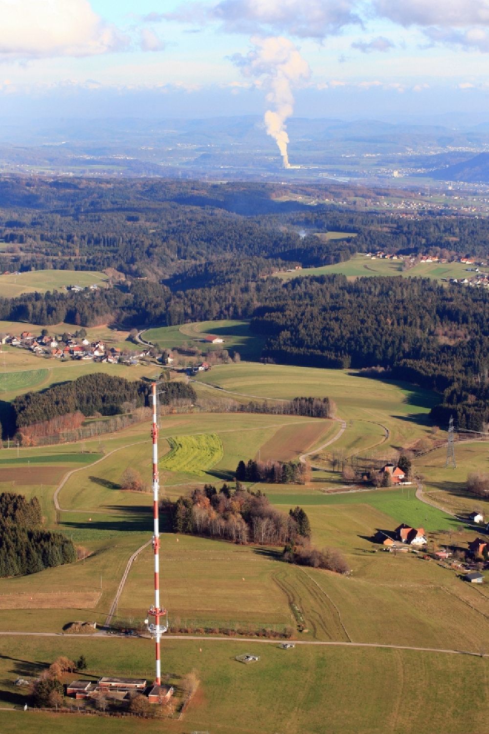 Aerial image Rickenbach - Radio tower and transmitter on the plateau of the Hotzenwald in the Black Forest in district Bergalingen in Rickenbach in the state Baden-Wurttemberg, Germany. In the background the steam column of nuclear power plant Leibstadt in Switzerland