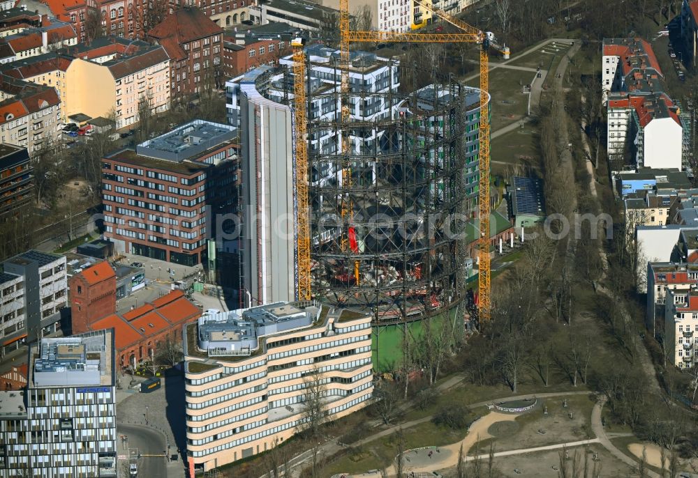 Aerial image Berlin - Gasometer high storage tank during conversion and renovation in the district Schoeneberg in Berlin, Germany