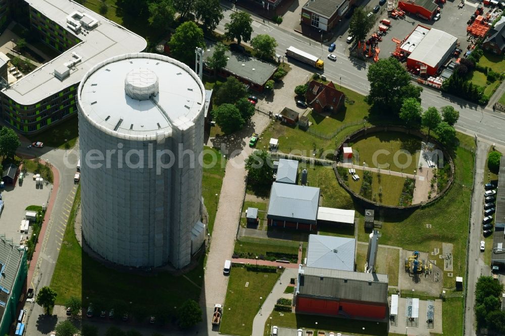 Aerial photograph Lübeck - Gasometer high storage tank on Geniner Strasse in Luebeck in the state Schleswig-Holstein, Germany