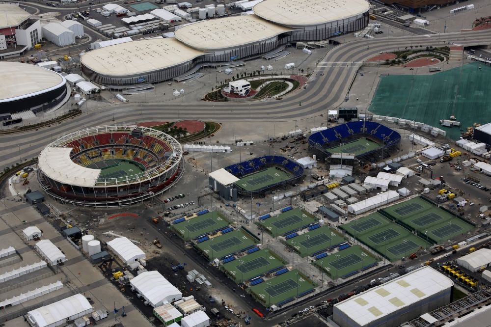Aerial image Rio de Janeiro - Building the tennis arena with green field in Barra Olympic Park before the summer playing games of XXII. Olympics in Rio de Janeiro in Rio de Janeiro, Brazil