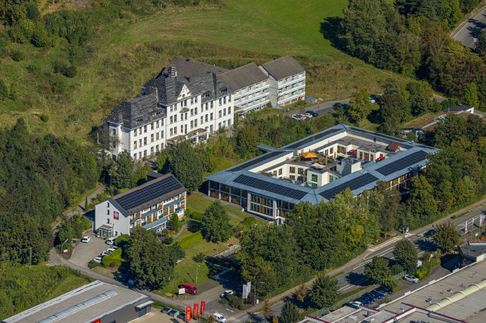 Elspe from above - Building of the retirement home - senior residence of the Caritas-Tagespflege Elspe with a view of the ruins of the old St. Franziskus-Haus on Bielefelder Strasse in Elspe in the state North Rhine-Westphalia, Germany
