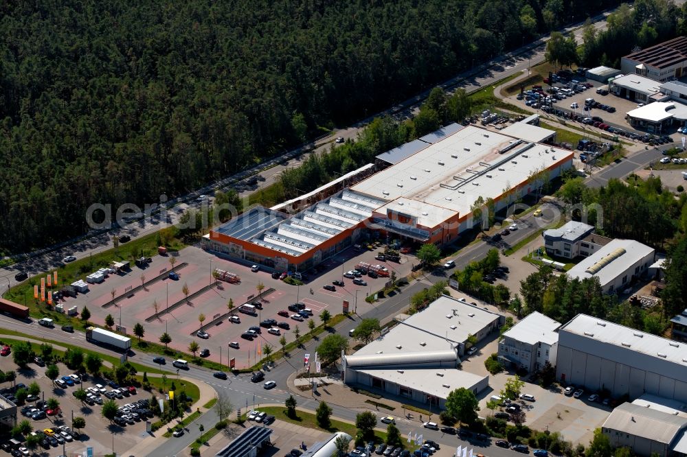 Aerial photograph Roth - Building of the construction market of OBI GmbH & Co. Deutschland KG in of Gildestrasse in Roth in the state Bavaria, Germany