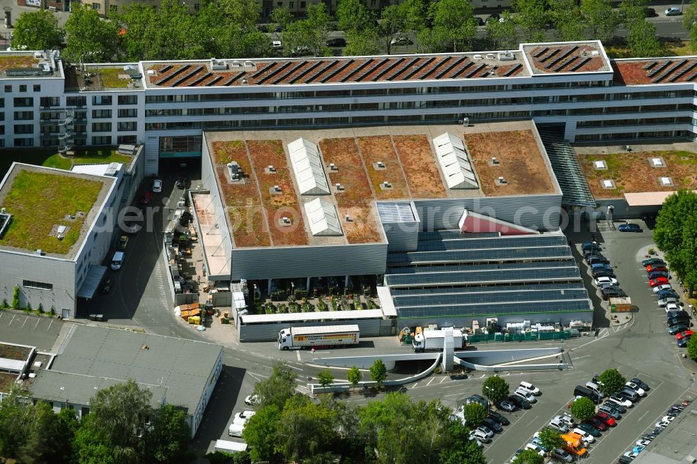Aerial image Berlin - Building of the construction market OBI on Ostseestrasse in the district Prenzlauer Berg in Berlin, Germany