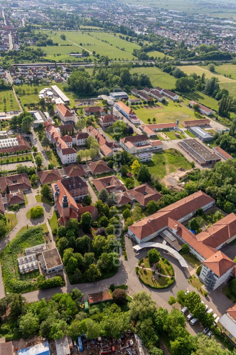 Landau in der Pfalz from above - Building of the retirement home Caritas Foerderzentrum St. Laurentius and Paulus and of the Jugendwerk St. Josef in the district Queichheim in Landau in der Pfalz in the state Rhineland-Palatinate, Germany