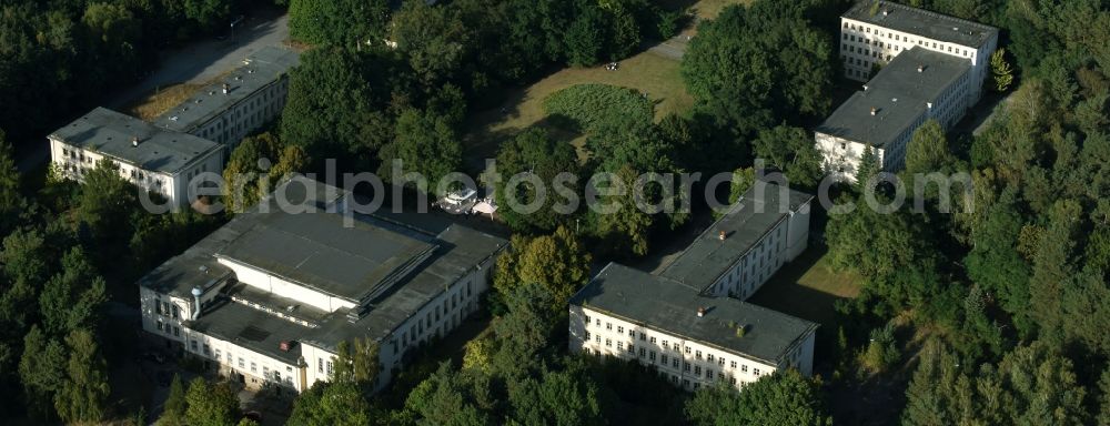 Bogensee from the bird's eye view: Vacant, unused building the former headquarters youth school and the Villa Waldhof on place Platz der Freundschaft the formerly Free German Youth of the former GDR in Bogensee in the state Brandenburg