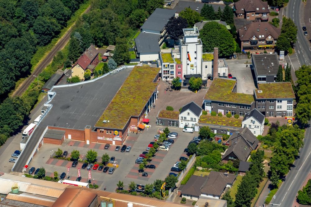 Aerial photograph Dorsten - Building the shopping center Lidl and REWE Markt Schulten on the grounds of the former Rose Brewery in Dorsten - Wulfen in North Rhine-Westphalia