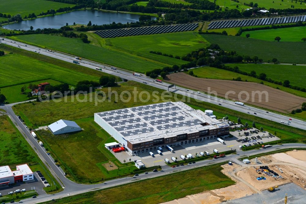 Neumünster from the bird's eye view: Building of the wholesale center of Henry Kruse GmbH & Co. KG on Neuenbrook in Neumuenster in the state Schleswig-Holstein, Germany