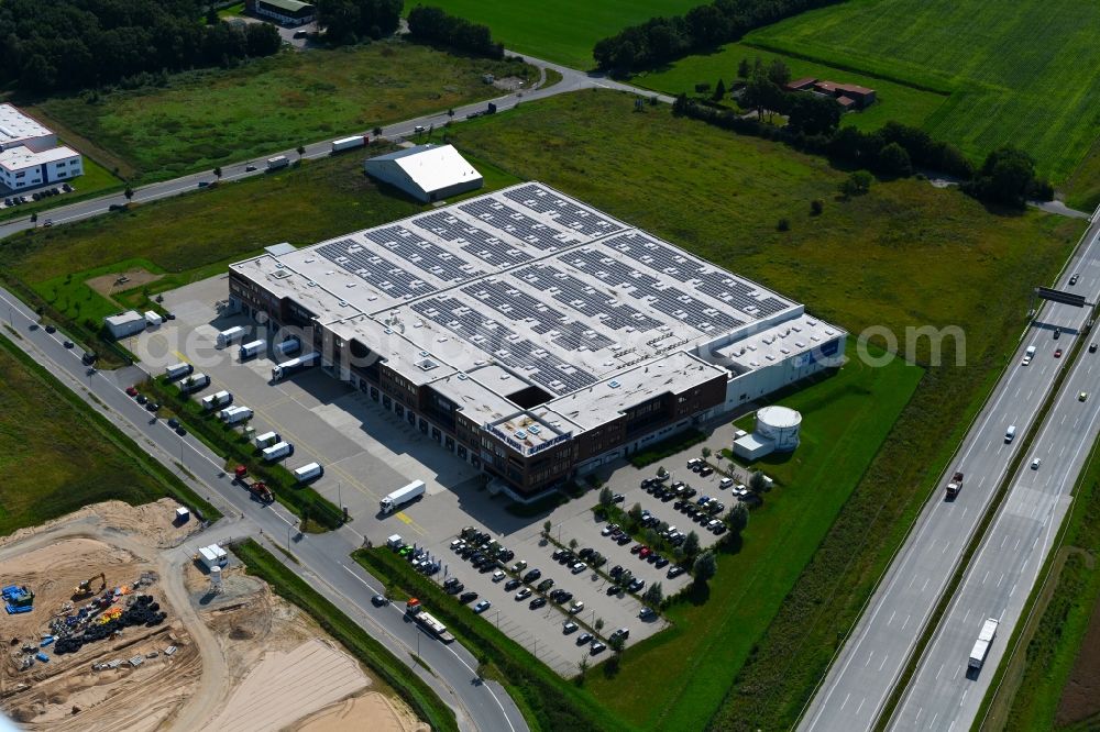 Neumünster from the bird's eye view: Building of the wholesale center of Henry Kruse GmbH & Co. KG on Neuenbrook in Neumuenster in the state Schleswig-Holstein, Germany
