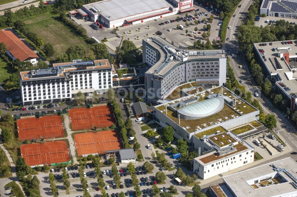Unterschleißheim from the bird's eye view: Complex of the hotel building INFINITY Hotel & Conference Resort Munich in Lohhof in the state Bavaria, Germany