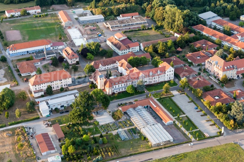 Landau in der Pfalz from the bird's eye view: Buildings of the Childrens and Youth Home Jugendwerk St. Josef in the district Queichheim in Landau in der Pfalz in the state Rhineland-Palatinate, Germany