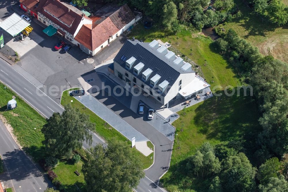 Obergeis from the bird's eye view: Building of a multi-family residential building on Kreuzeichenstrasse in Obergeis in the state Hesse, Germany