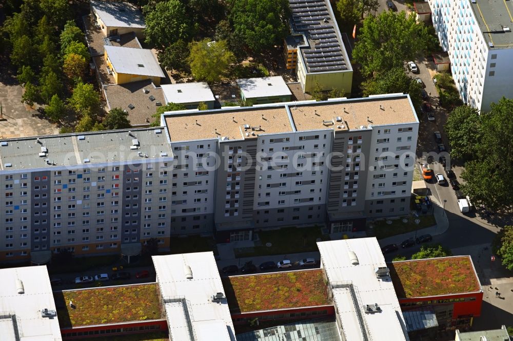 Aerial photograph Berlin - Building of a multi-family residential building Otto-Schmirgal-Strasse corner Erieseering in the district Lichtenberg in Berlin, Germany