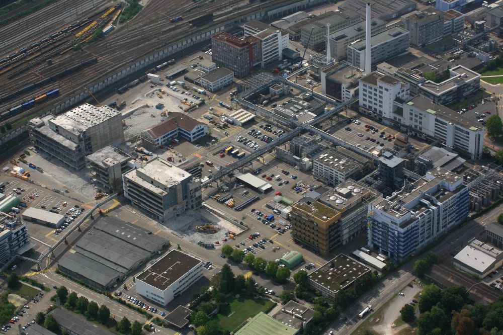 Pratteln from above - Buildings and production halls on the premises of the pharmaceutical manufacturer Novartis Schweizerhalle in Pratteln in the canton Basel-Landschaft, Switzerland