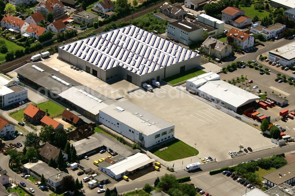 Aerial image Heldenbergen - Building and grounds of the company Reifen Center Wolf GmbH & Co. KG in Heldenbergen in the state Hesse, Germany