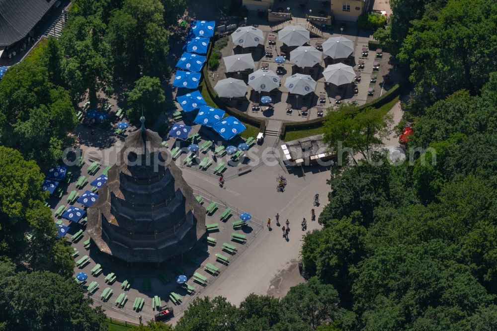 Aerial photograph München - Building of the restaurant with Chinesischer Turm in english garden in Munich in the state Bavaria, Germany