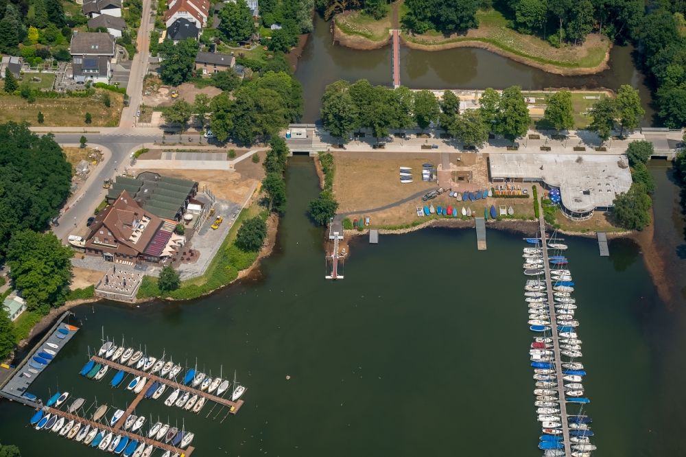 Haltern am See from above - Building of the restaurant Stadtmuehle Haltern with sailing boat moorings and boat berths on the Muehlenbach shore area in Haltern am See in the state North Rhine-Westphalia, Germany