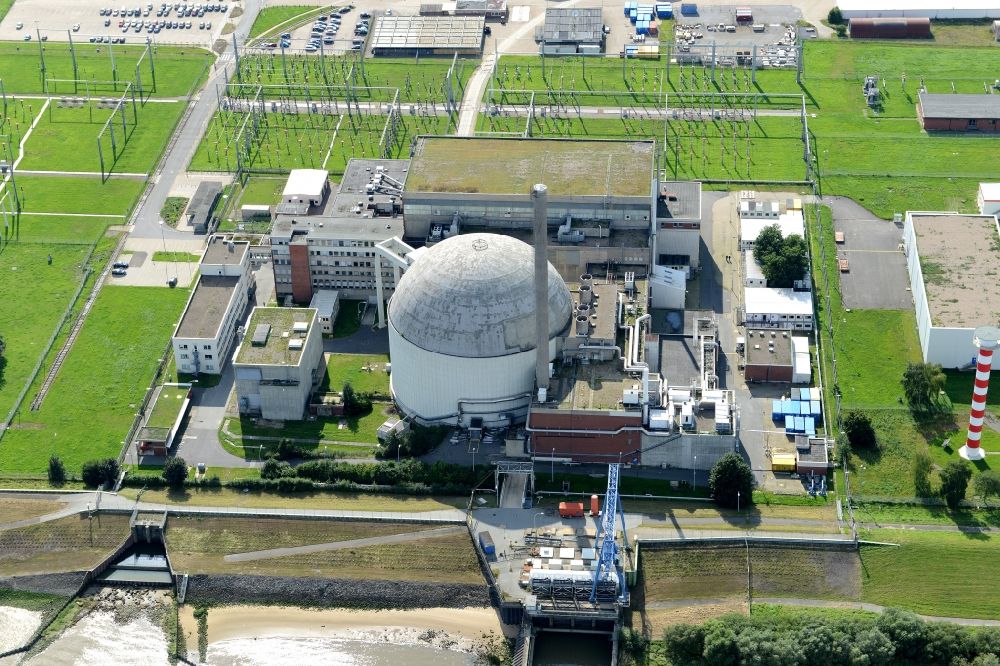 Stade from above - Building the decommissioned reactor units and systems of the NPP - NPP nuclear power plant in Stadersand in the state Lower Saxony