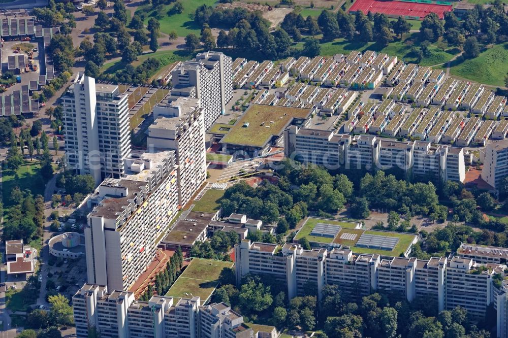 München from the bird's eye view: Building of the Olympiadorf residential complex in Munich, Bavaria. The one-storey bungalows and several high-rise buildings and terraces of the former Olympic village are used as the student dormitory