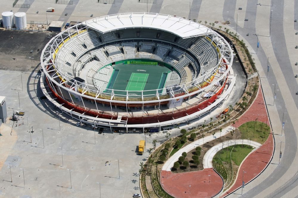 Rio de Janeiro from the bird's eye view: Building the tennis arena with green field in Barra Olympic Park before the summer playing games of XXII. Olympics in Rio de Janeiro in Rio de Janeiro, Brazil