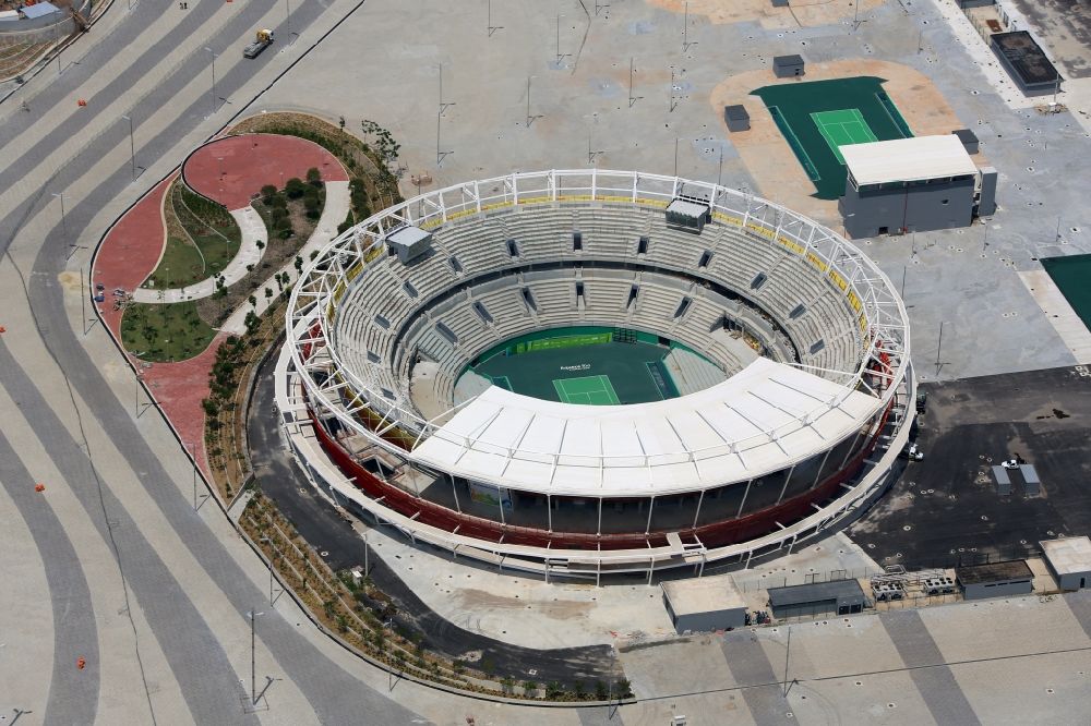 Rio de Janeiro from the bird's eye view: Building the tennis arena with green field in Barra Olympic Park before the summer playing games of XXII. Olympics in Rio de Janeiro in Rio de Janeiro, Brazil