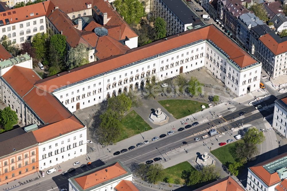 München from above - Overview of the Leopoldstrasse with buildings of the University LMU at the Geschwister-Scholl-Platz and Ludwigskirche in the district Schwabing in Munich in the federal state of Bavaria, Germany