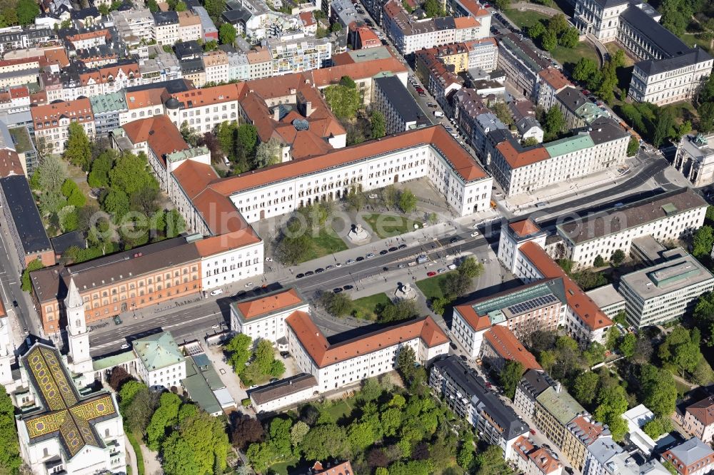 München from the bird's eye view: Overview of the Leopoldstrasse with buildings of the University LMU at the Geschwister-Scholl-Platz and Ludwigskirche in the district Schwabing in Munich in the federal state of Bavaria, Germany