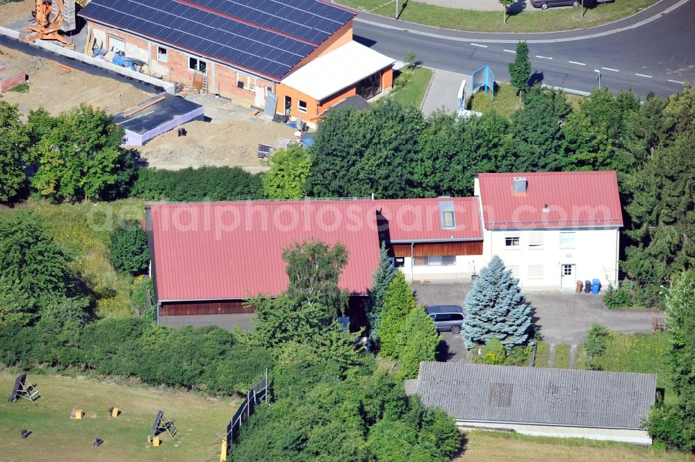 Rottendorf from the bird's eye view: View of building of WFL GmbH at business park in Rottendorf in Bavaria