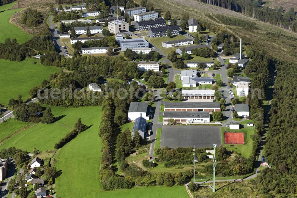 Erndtebrück from the bird's eye view: Building complex of the Bundeswehr military barracks of the Hachenberg barracks on Grimbachstrasse in Erndtebruck in the Siegerland in the state of North Rhine-Westphalia, Germany