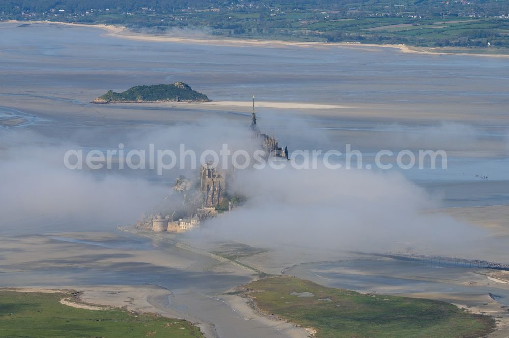 Le Mont-Saint-Michel from the bird's eye view: Building complex of the former monastery and Benedictine abbey in Le Mont-Saint-Michel in Normandy, France