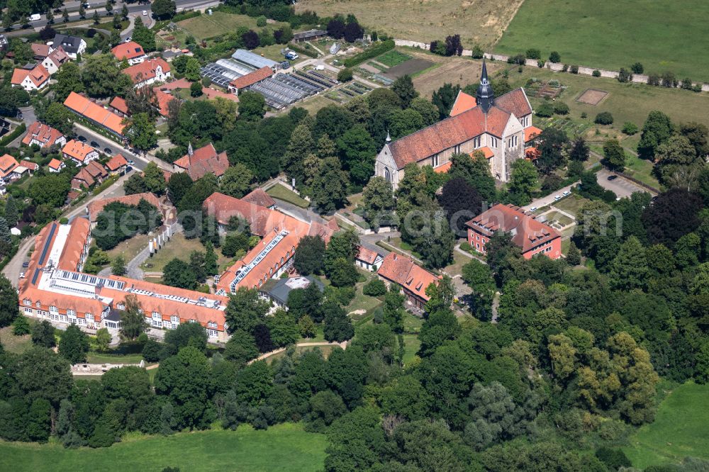 Braunschweig from the bird's eye view: Building complex of the former monastery and today's MMI Marketing Management Institute GmbH and the church Klosterkirche Riddagshausen in Braunschweig in the state Lower Saxony, Germany