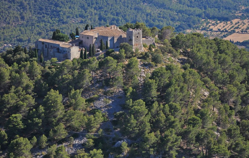 Pollença from above - Building complex of the former monastery Son Puig de Maria and today hostel and restaurant at Pollenca Mallorca in Balearic Islands, Spain