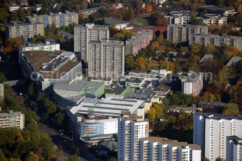 Berlin from the bird's eye view: Building complex of the shopping mall Gropius Passagen in the Gropiusstadt part of the district of Neukoelln in Berlin in Germany. The mall is located on Johannisthaler Chaussee amidst residential areas