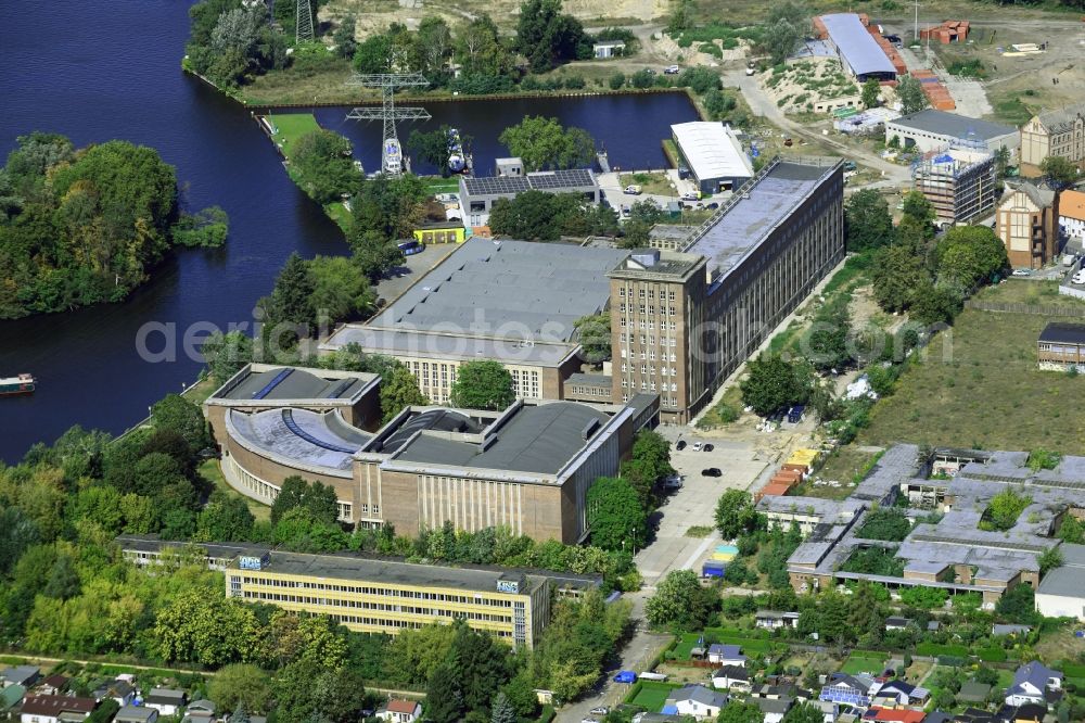 Berlin from the bird's eye view: Complex of buildings with satellite dishes on the transmitter broadcasting center Funkhaus Berlin Nalepastrasse on Nalepastrasse in the district Oberschoeneweide in Berlin, Germany