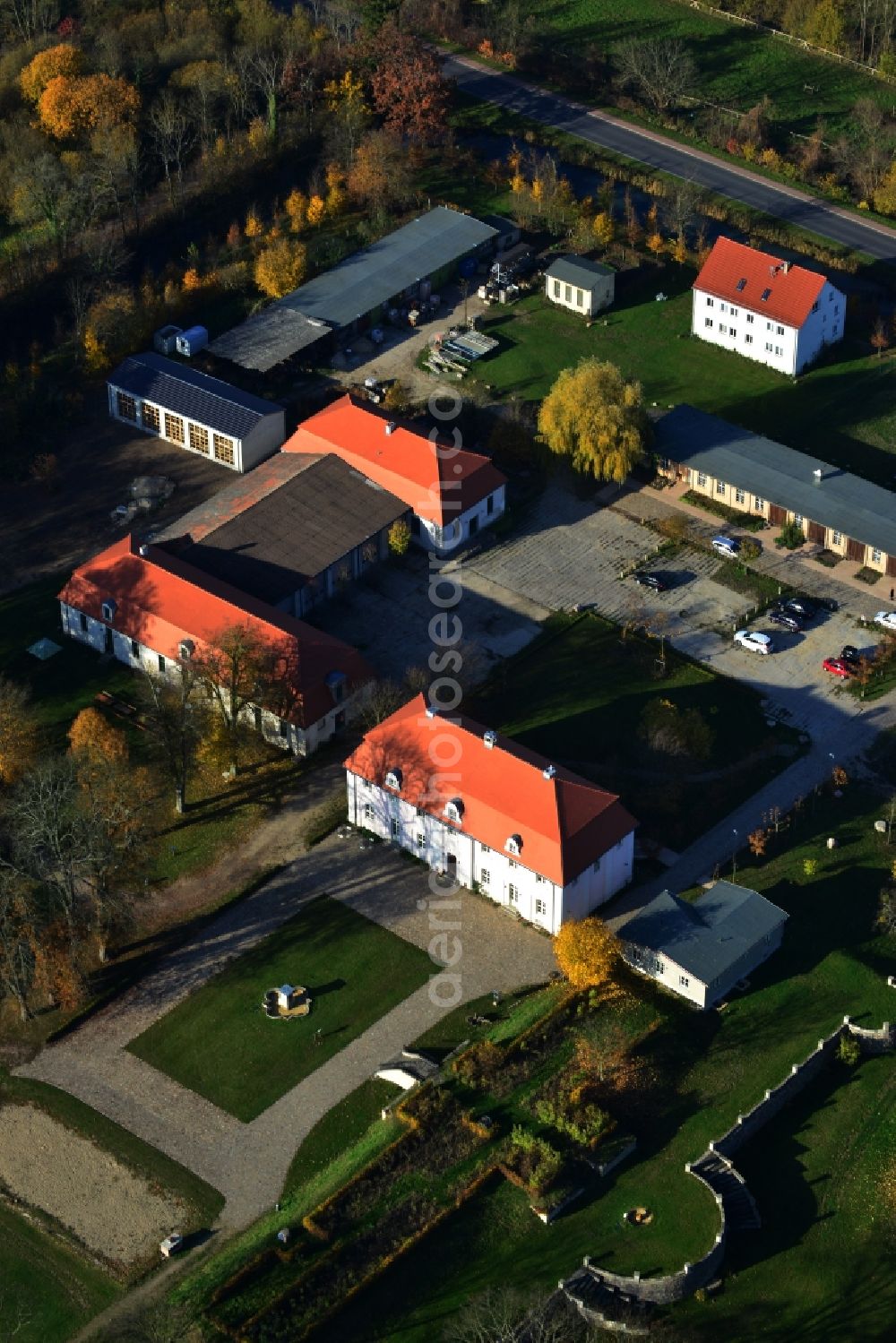 Aerial image Flieth-Stegelitz - Building complex with homestead. On Haussee located former castle with park. Now a hotel, restaurant and banquet hall in Flieth-Stegelitz in the state of Brandenburg