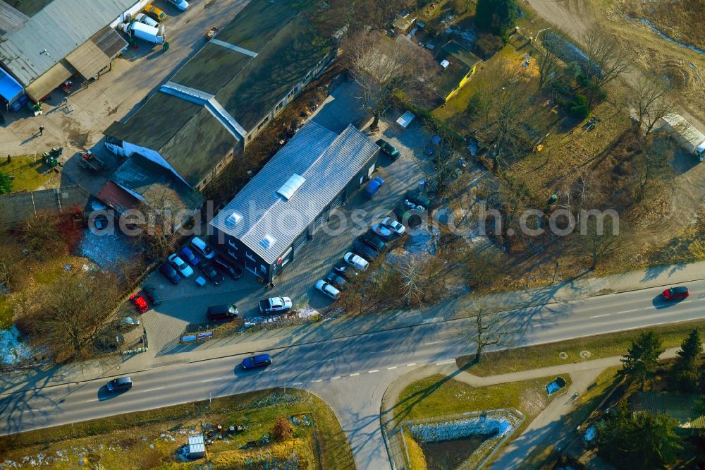Bernau from the bird's eye view: Building complex and grounds of the automotive repair shop AUTOFIT WOTSCHKE on Ruednitzer Chaussee in Bernau in the state Brandenburg, Germany