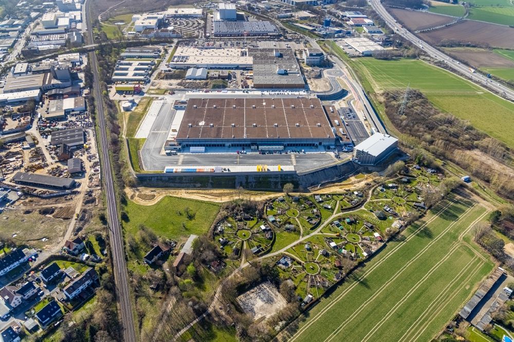 Witten from the bird's eye view: Building complex and grounds of the logistics center with a new Amazon building on Menglinghauser Strasse - Siemensstrasse in the district Ruedinghausen in Witten at Ruhrgebiet in the state North Rhine-Westphalia, Germany