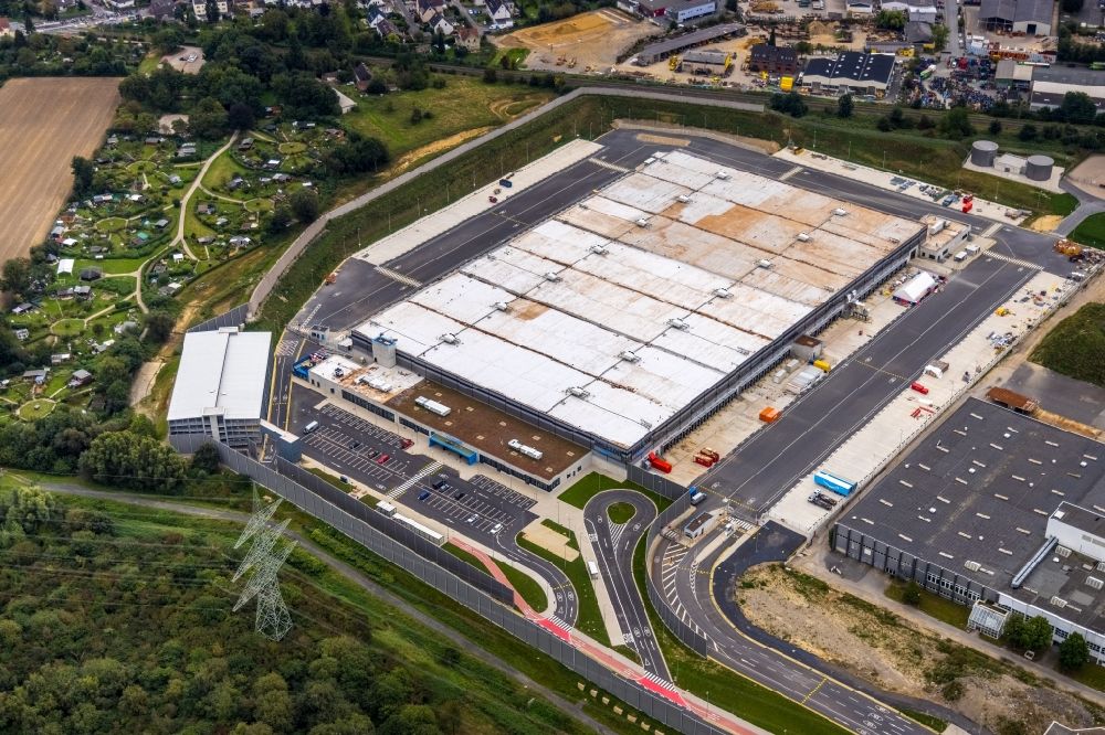 Aerial photograph Witten - Building complex and grounds of the logistics center with a new Amazon building on Menglinghauser Strasse - Siemensstrasse in the district Ruedinghausen in Witten at Ruhrgebiet in the state North Rhine-Westphalia, Germany