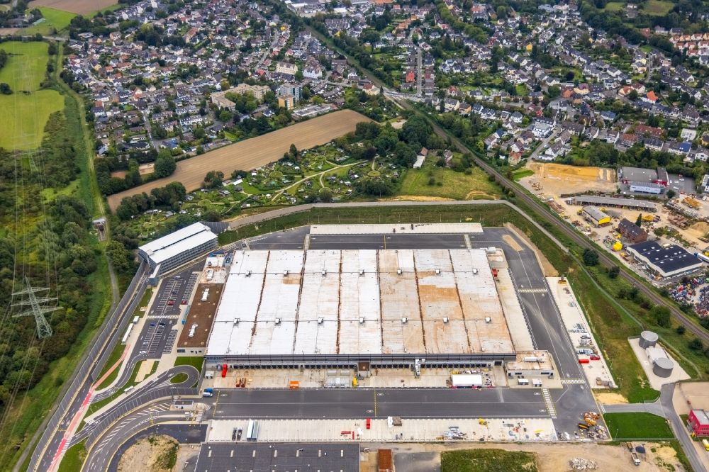 Witten from above - Building complex and grounds of the logistics center with a new Amazon building on Menglinghauser Strasse - Siemensstrasse in the district Ruedinghausen in Witten at Ruhrgebiet in the state North Rhine-Westphalia, Germany