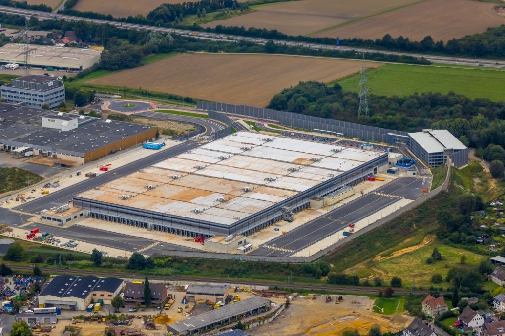 Witten from above - Building complex and grounds of the logistics center with a new Amazon building on Menglinghauser Strasse - Siemensstrasse in the district Ruedinghausen in Witten at Ruhrgebiet in the state North Rhine-Westphalia, Germany